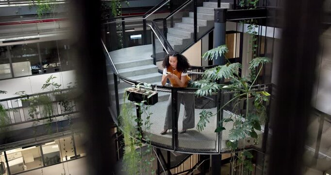 Woman, thinking and phone on stairs for business, research and planning green initiative for company. PR, campaign manager and tech in workplace for policy update, eco project and incentive ideas