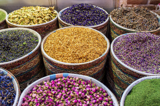 Variety of dried flowers and herbal teas in a traditional bazaar, Iran.
