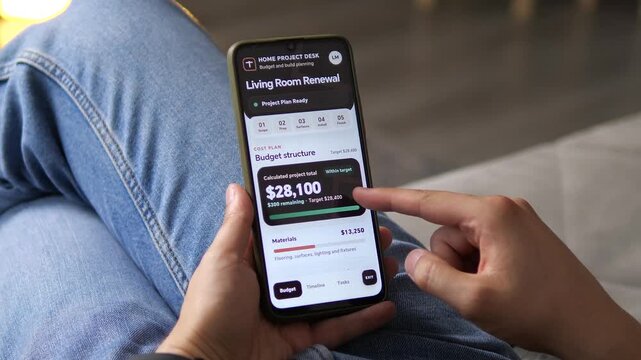 Person reviews a home renovation timeline and budget on a smartphone, tracking materials, labor and project costs as households seek tighter control over rising remodeling expenses.
