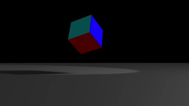 Rotating multicolored geometric cube performing complex tumbling motion in a dark studio setting for high quality digital animation video footage