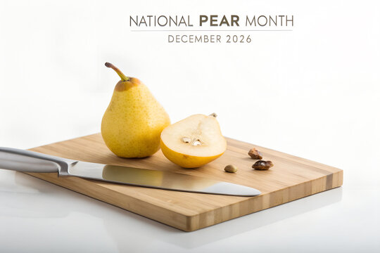 Fresh yellow pears on wooden cutting board with knife and seeds