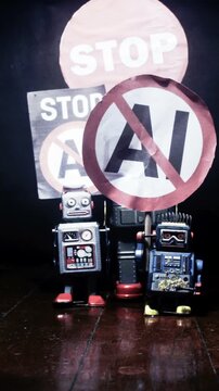 Reto robots with Stop AI signs stop motion 
