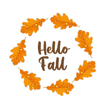 Round frame from yellow oak autumn leaves with scattered dewdrops isolated on white background