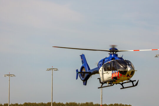 Police helicopter is landing at Rotterdam The Hague Airport