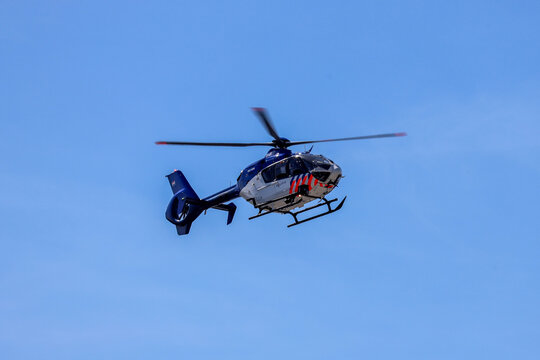 Police helicopter is landing at Rotterdam The Hague Airport