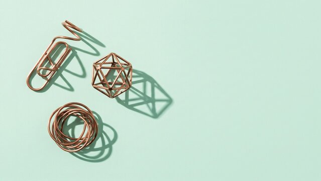 Abstract Copper Geometric Objects with Shadows on Mint Green Background