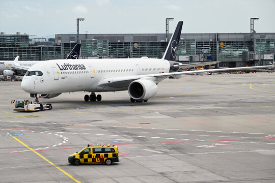 Lufthansa airplanes parked at Frankfurt international airport terminal