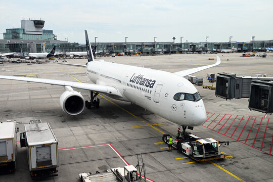 Lufthansa airplanes parked at Frankfurt international airport terminal