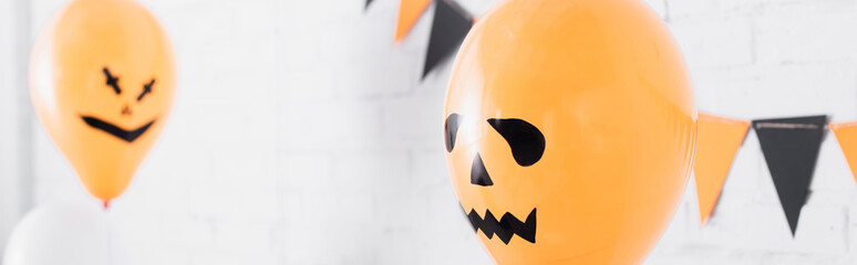 Fototapeta premium Creative Halloween balloons bring a spooky vibe to autumn celebrations