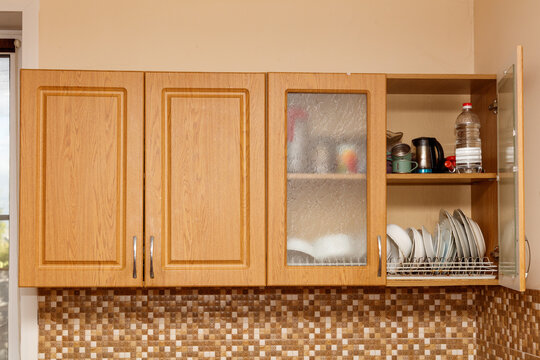 Wooden kitchen cabinets with glass door and open shelf