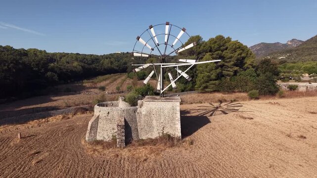 Mallorca Ufanes traditional windmill in a dry landscape renewable energy and historical architecture concept sunny day