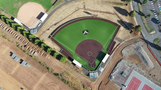 4K aerial drone footage of baseball and softball fields at Camas High School in Washington, USA, showing athletic facilities, sports diamonds, school campus and outdoor recreation complex