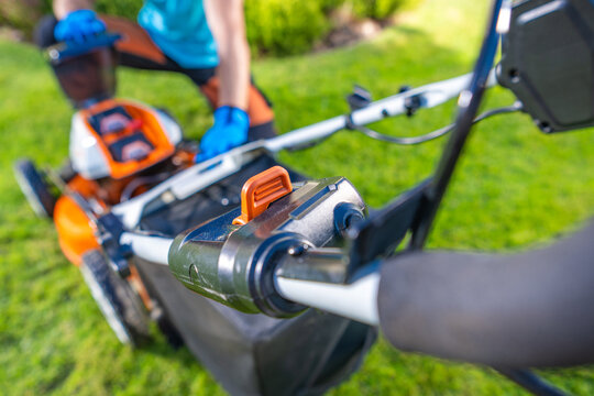 Lawn maintenance using a lawnmower in a residential yard