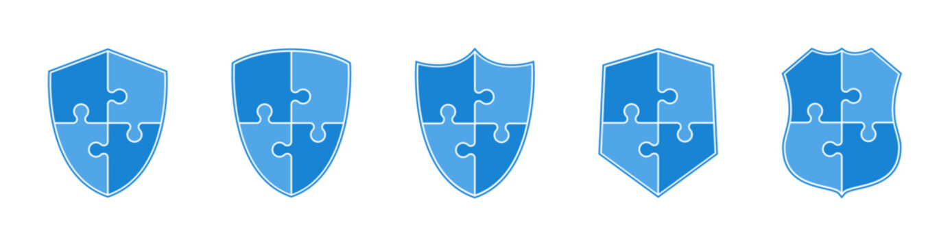 Shields made of puzzle pieces. Set of blue security shield icons made of jigsaw puzzles. Design elements for concept of safety and protection. Vector.