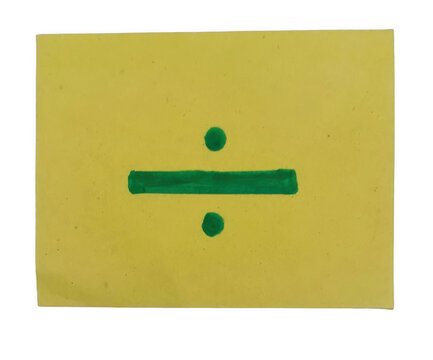 Green division sign drawn with a marker on a yellow paper background isolated on transparent background