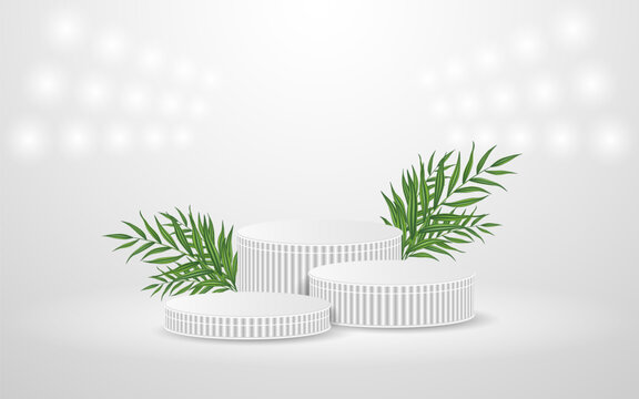 White podium with green leaves on the back for product presentation. Cosmetic product display. stage or podium 