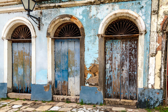Blue wooden doors on an old house in the historic town of Alcantara, Maranhao.