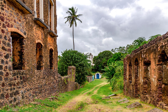 Street lined with stone ruins in the historic city of Alcantara, Maranhao.