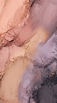 Abstract background of colorful cosmetic powder textures in soft pastel shades.