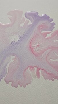 Fluid Paint Spreading Animation with Pink and Purple Hues, Creating Abstract Organic Shapes in a Looping Motion.