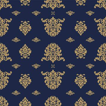 Damask pattern in rich gold and deep blue creates a luxurious vintage backdrop for wallpaper interiors and elegant textile designs inspired by classic baroque decor.