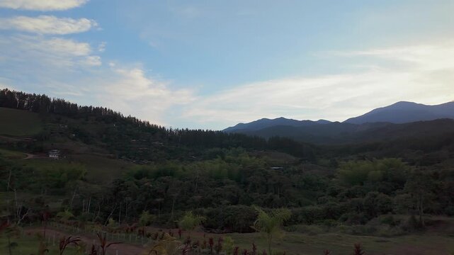 panoramic sunset view of colombian mountains and rural landscape
