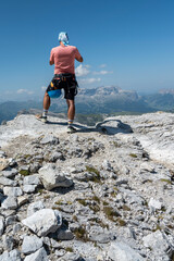 A man on the way to Monte Lagazuoi Piccolo. Alps, Dolomites, Italy. © Tomasz Warszewski