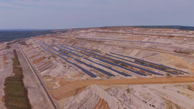 Aerial view of solar panel farm in german opencast lignite mine
