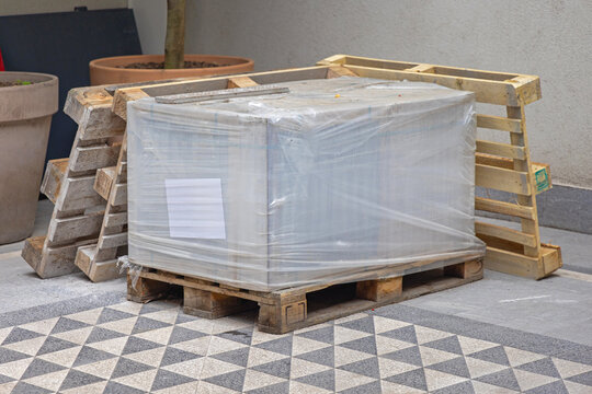 Plastic Foil Wrap Material at Wooden Euro Pallet Construction Site Delivery