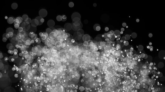Floating abstract particle bokeh on dark background. Shot on super slow motion camera 1000 fps.