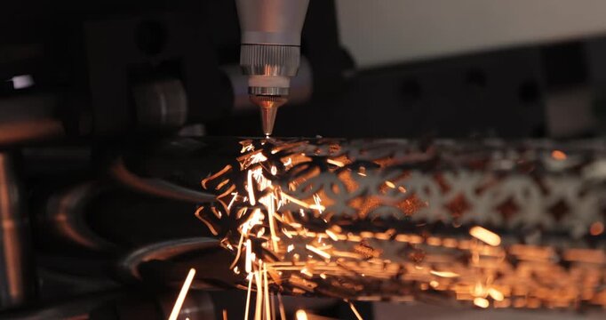 CNC Laser and gas cutting of metal, modern industrial technology.