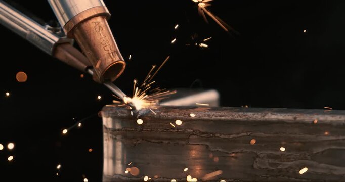 Laser welding machine. Shot on super slow motion camera 1000 fps. Laser welding is shown in close-up