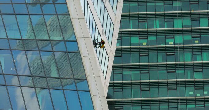 Professional Window cleaners at work.