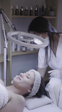 Calm skincare session captured under a bright ring light