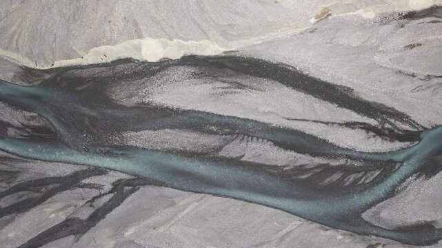 Top-Down Aerial View of Kuitun Riverbed Textures at Dushanzi Grand Canyon in Xinjiang: Water Erosion Gullies, Mudstone Strata and Earth Art