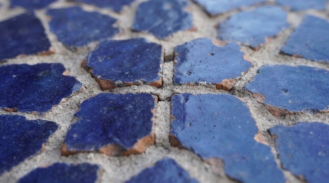 Generated with AI Macro texture of handmade blue Moroccan zellige ceramic tile pieces with an uneven surface.