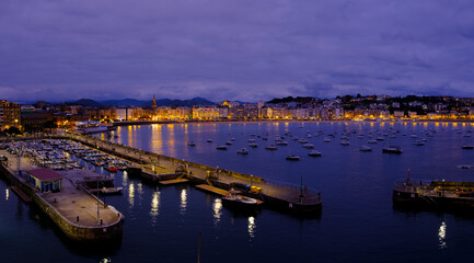 Fototapeta premium La Concha Bay and Harbor in San Sebastian at Night, Basque Country, Spain