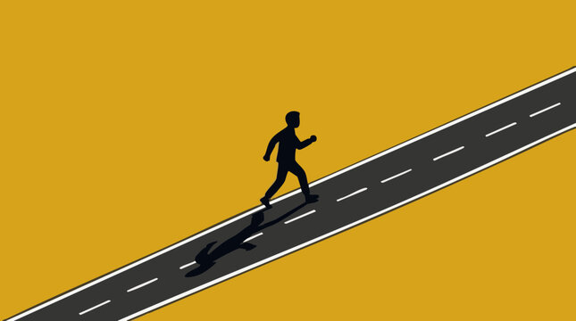 Silhouette of a man walking uphill on a road, symbolizing progress and ambition