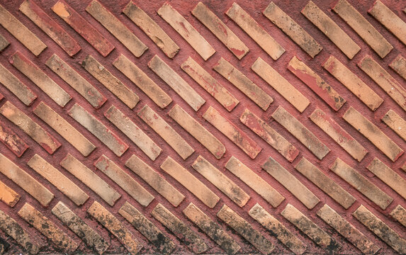 Traditional Rustic Terracotta Brick Patterned Wall Background.
