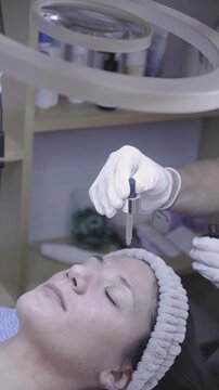 Precise applicator glides gently along the eyelid in a tranquil skincare session