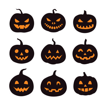 Set of vector black silhouettes of halloween carved pumpkins with glowing faces