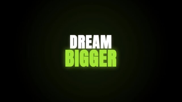 A motivational video featuring the text 'DREAM BIGGER' in a bold, glowing font against a dark background. The green and white glow pulses subtly, creating an inspiring and modern aesthetic.