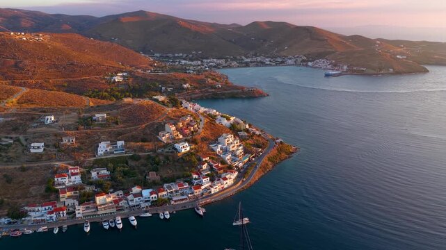 Panoramic aerial view of the harbour bay of Kea - Tzia island with Vourkari village and the port of Korissia in the background during summer sunset time, Cyclades, Greece