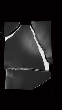 Abstract dark background with dramatic light cracks.