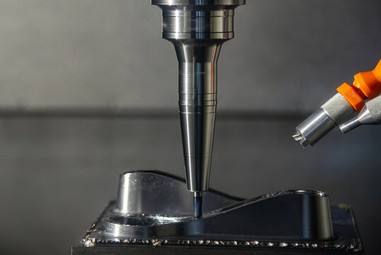 Mold and die parts cutting process on CNC milling machine using ball nose end mill tool