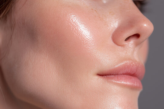 Dewy skin glow luminous cheek hydrated complexion close up minimal composition natural lip