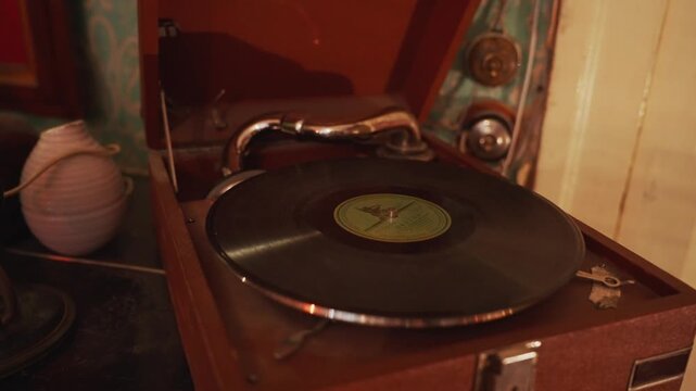 Vintage record player spinning vinyl lp