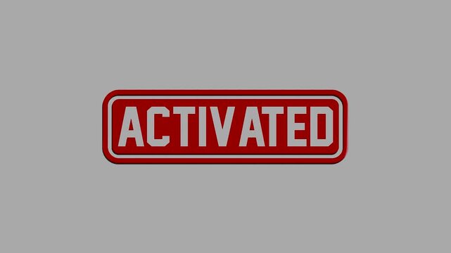 A shiny red rectangular button with the word activated written in bold white letters isolated on a gray background