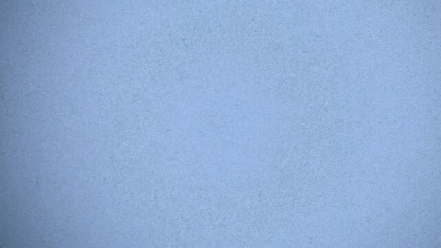 Minimalist light blue paper texture background, soft pastel matte surface pattern