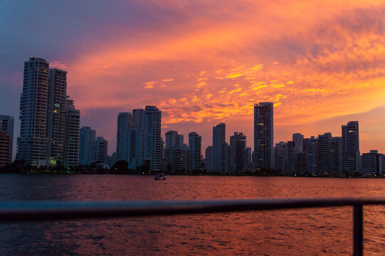 Cartagena skyline with boat railing at colorful sunset